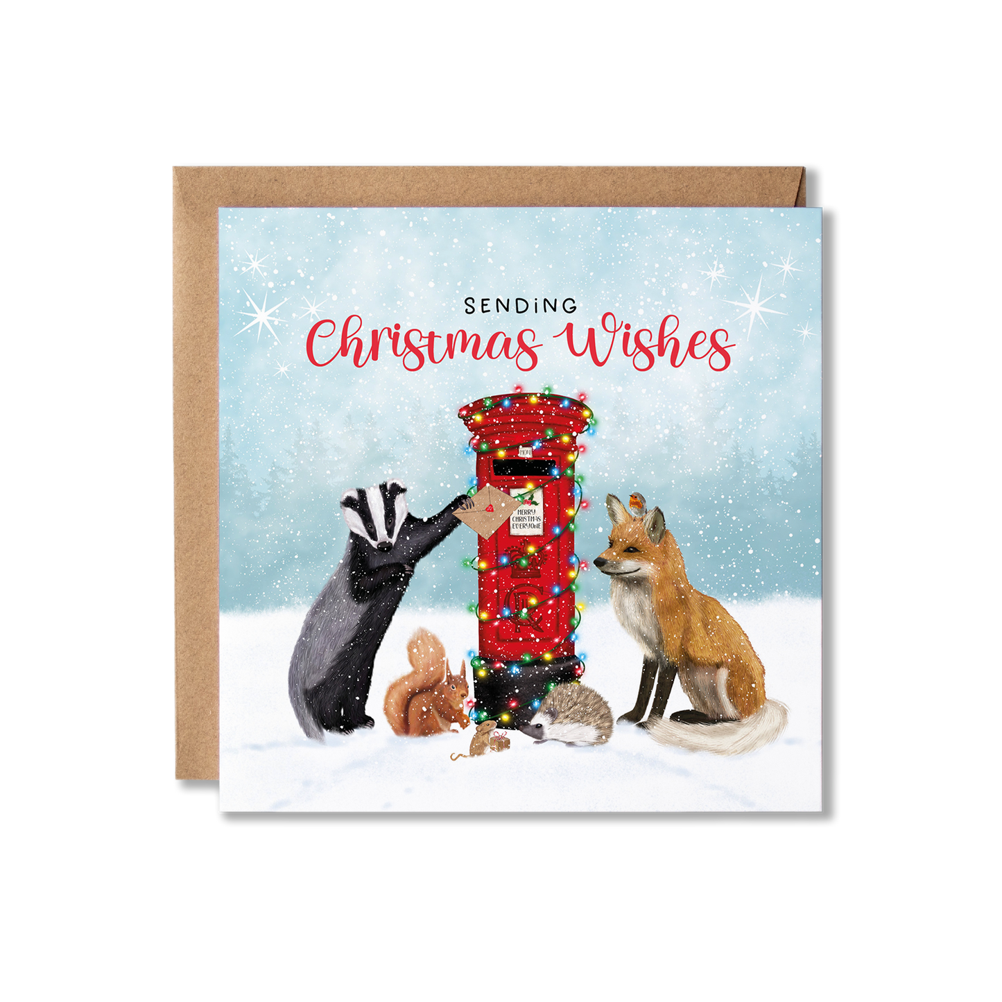 British woodland animals Christmas card featuring a Badger, Fox, Squirrel, Mouse, Hedgehog and a Robin posting a Christmas card at a red post box decorated in Christmas lights.