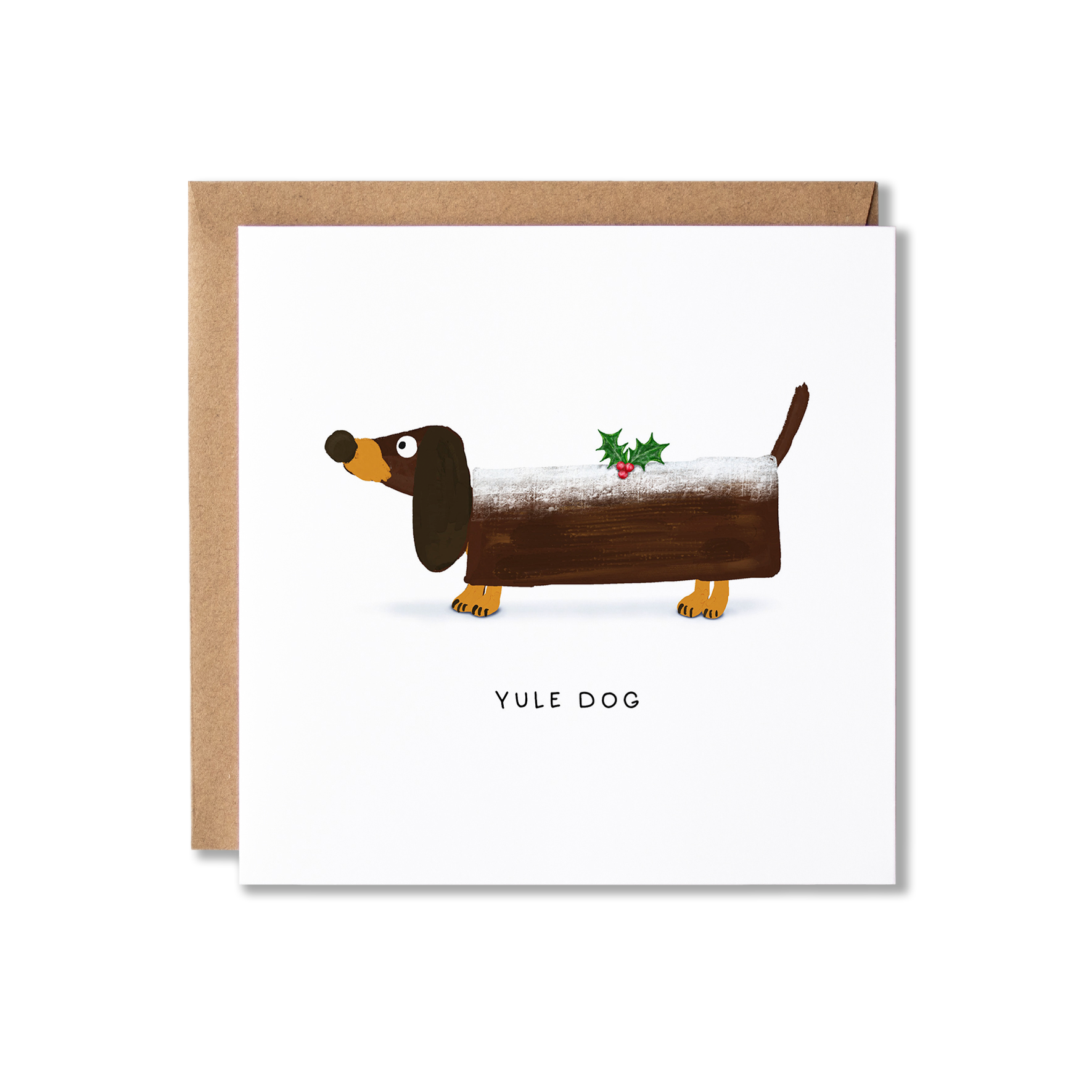 Christmas card with illustration of a Dachshund sausage dog wearing a log shape that looks like a Yule log with a spring of holly on top and the message Yule Dog.