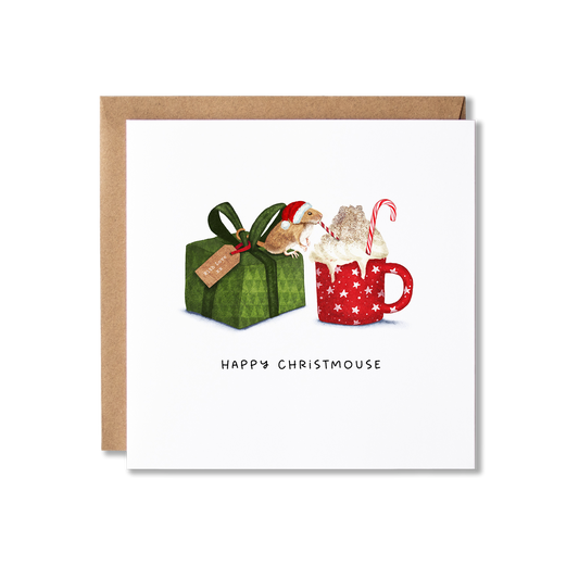 Christmas card with illlustration of a mouse in a Santa hat sitting on top a green present wrapped with a green ribbon that has a 'With Love x' tag on it, drinking a hot chocolate topped with whipped cream using a red and white straw with the message Happy Christmouse.